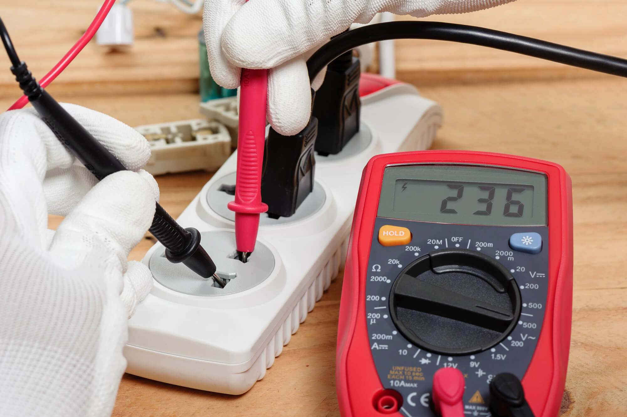 Electrician Using Multimeter
