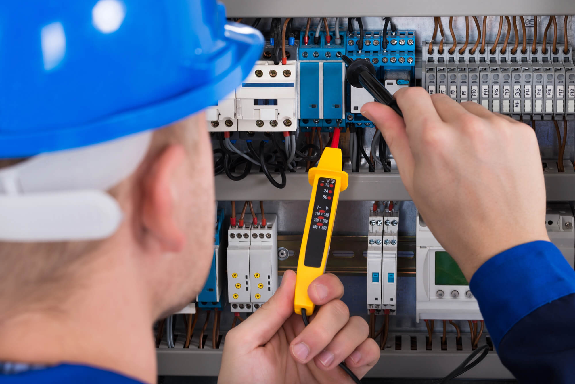 Licensed electrician performing electrical panel upgrade