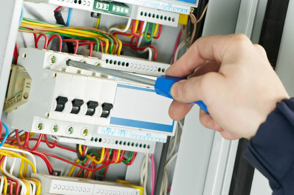 Electrician Checking Electrical Panel